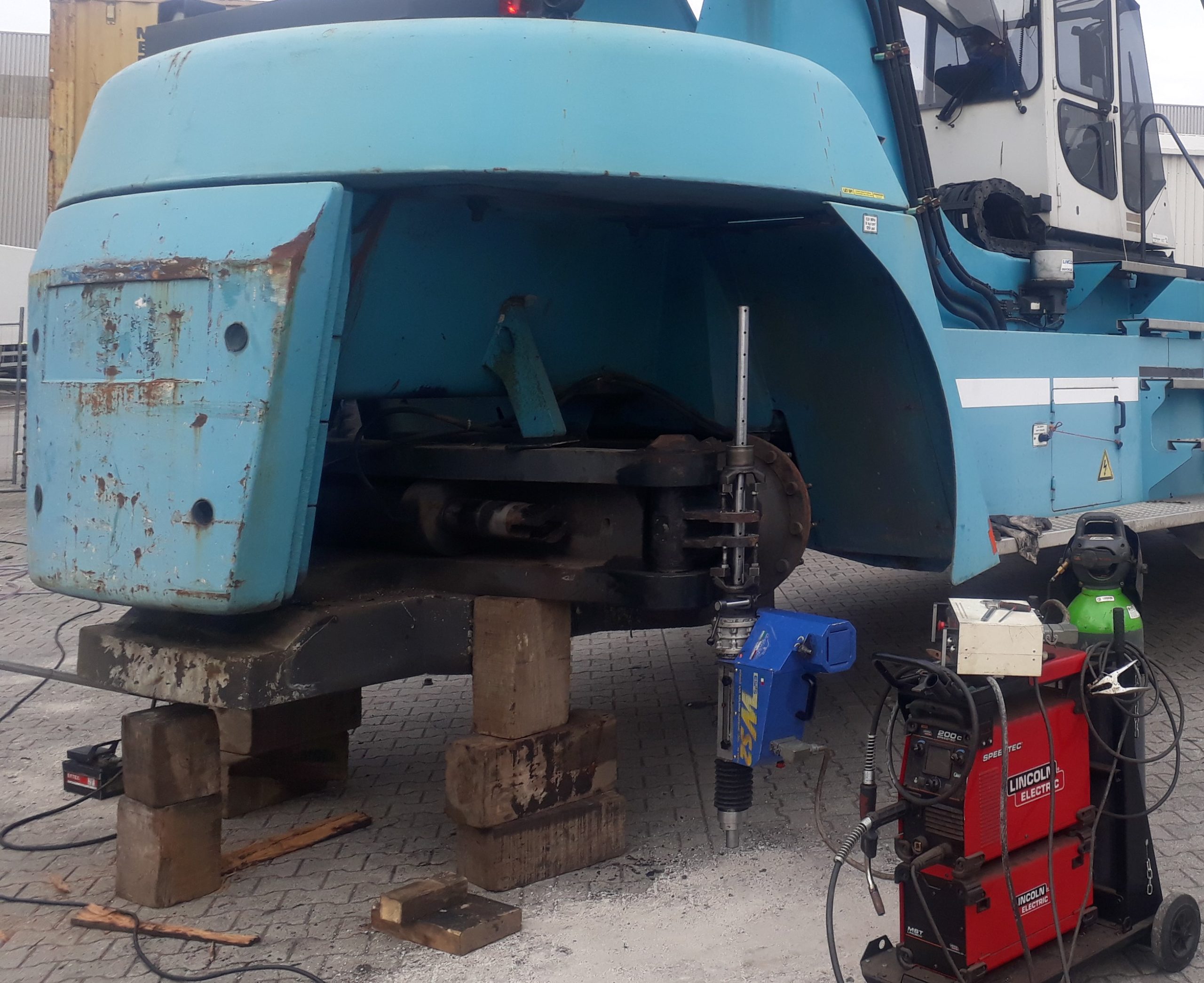 mobiel kotteren reachstacker